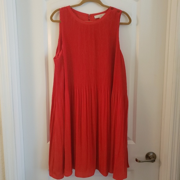 red pleated swing dress